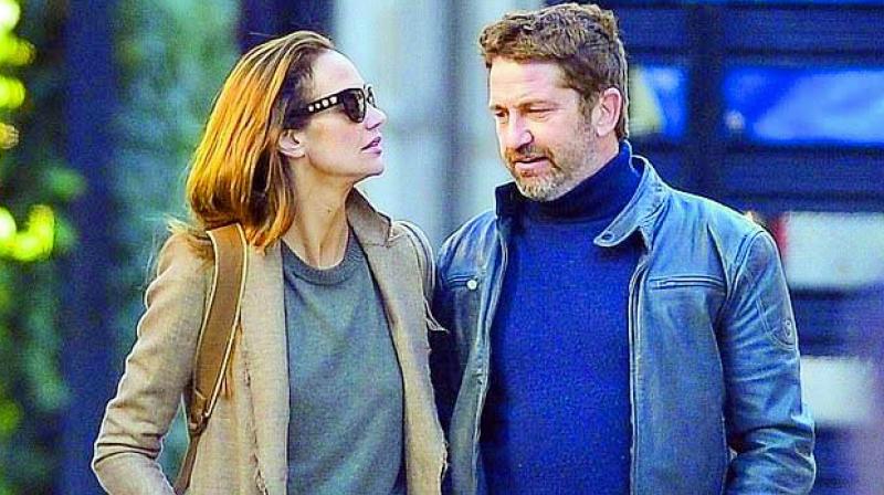 All that loving: Gerard Butler with Morgan Brown