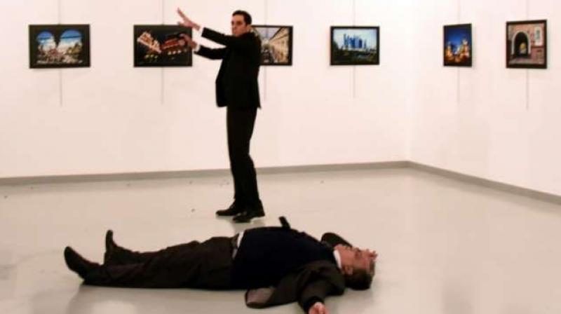 A Turkish policeman opened fire on Karlov while he was delivering a speech at the opening of a photography exhibition, in an assassination that stunned Russia and Turkey. (Photo: AFP)