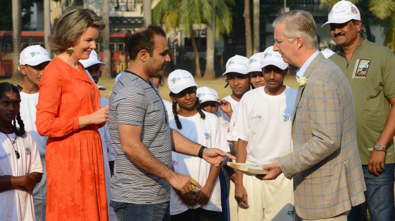 Virender Sehwag also presented King Philippe with an autographed bat.(Photo: Rajesh Jadhav / Deccan Chronicle)