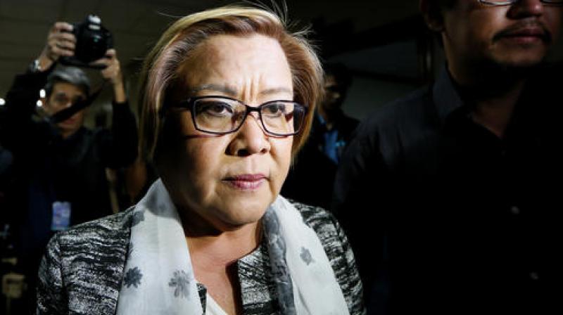 De Lima on Tuesday branded Duterte a \sociopathic serial killer\ as she called for ordinary Filipinos to stand up in opposition to his drug war. (Photo: AP)