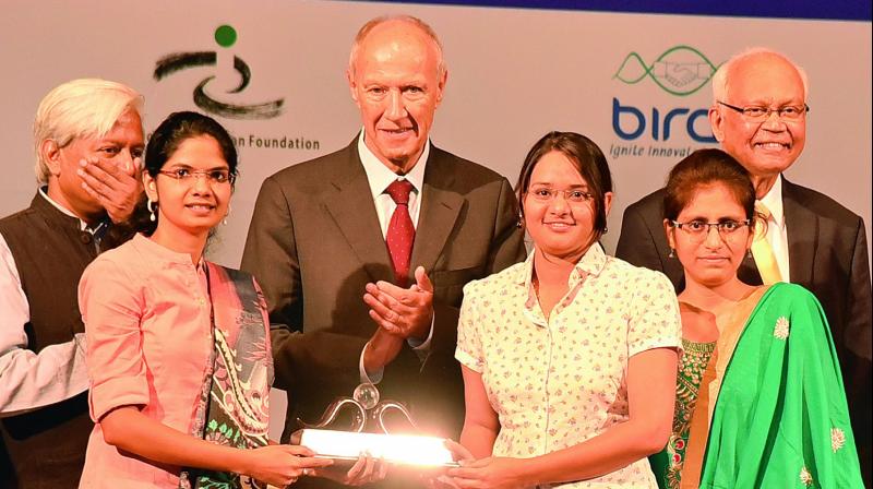 Team  members M. Madhumala and Harsha Nagar receive the Gandhian Young Technological Innovation Award