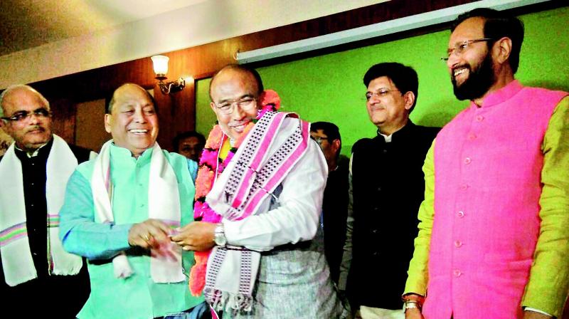 Nongthombam Biren Singh is greeted after he was elected at BJP legislature party leader in Imphal on Monday. (Photo: PTI)