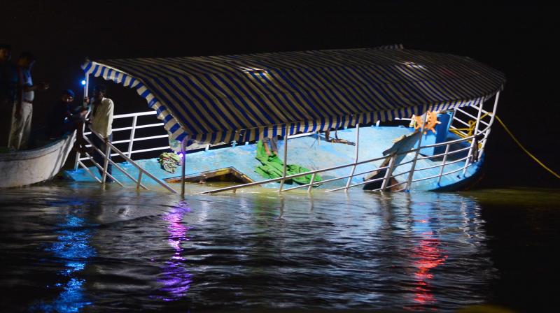The ill-fated boat which was towed to the Ferry Ghat near Pavitra Sangamam in Vijayawada on Sunday. (Photo: DC)