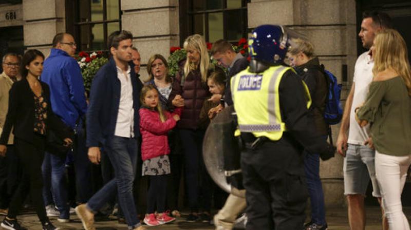 London police say they are responding to reports that a vehicle hit pedestrians on London Bridge and that there were stabbings at busy Borough Market nearby. (Photo: AP)