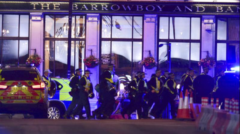 Witnesses described the van speeding into several pedestrians on London Bridge and then the knife-wielding men sprinting towards bars packed with revellers enjoying a Saturday night out. (Photo: AP)