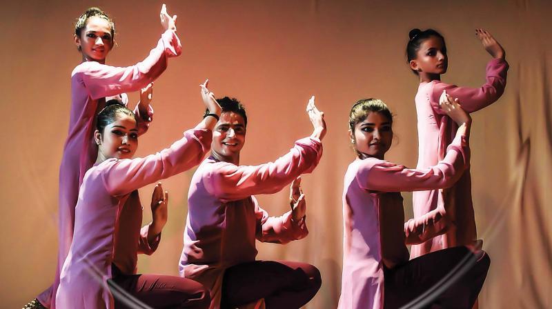 Tushar and Pooja with their dance troupe.