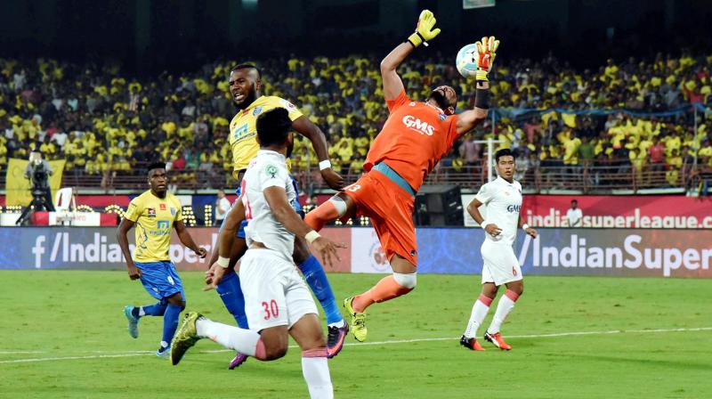 Kerala Blasters FC ( Yellow Jersey) and Delhi Dynamos FC in during the match of the 3rd season of Indian Super League ( ISL) 2016 at Nehru stadium Kochi on Sunday (Photo: AP)