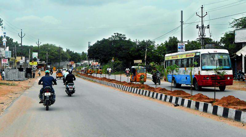 Motorists travelling through the stretch of Errakunta-Pahadishareef arterial road.   (Photo: DC)