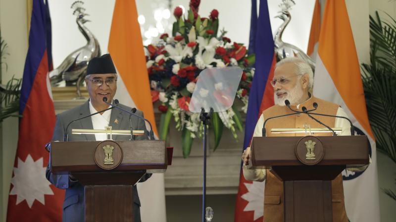 The pacts were signed after comprehensive talks between Prime Minister Narendra Modi and his Nepalese counterpart Sher Bahadur Deuba on strategic bilateral and regional issues. (Photo: PTI)