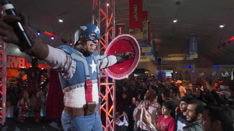A man wears a Captain America costume during the Saudi Comic Con (SCC) which is the first event of its kind to be held in Jiddah, Saudi Arabia. (Photo: AP)