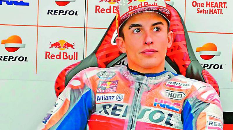 Repsol Hondas Marc Marquez sits in the paddock  during the MotoGP Valencia Grand Prix at the Ricardo Tormo race track on Saturday. 	(Photo: AFP)