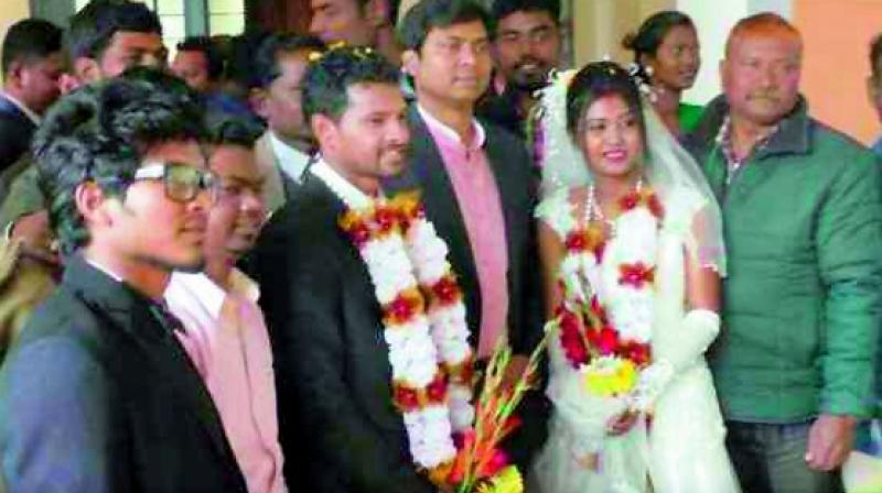 Indian hockey player Birendra Lakra with Rashmita and friends after his marriage.