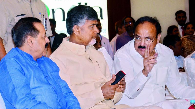 Chief Minister N. Chandra Babu Naidu has a word with Union urban development minister M. Venkaiah Naidu as minister of state (independent charge) for development of the north-eastern region Dr Jitendra Singha looks on during the inauguration of 20th National Conferance on e-Governance at a Hotel in Visakhapatnam on Monday. (Photo: DC)