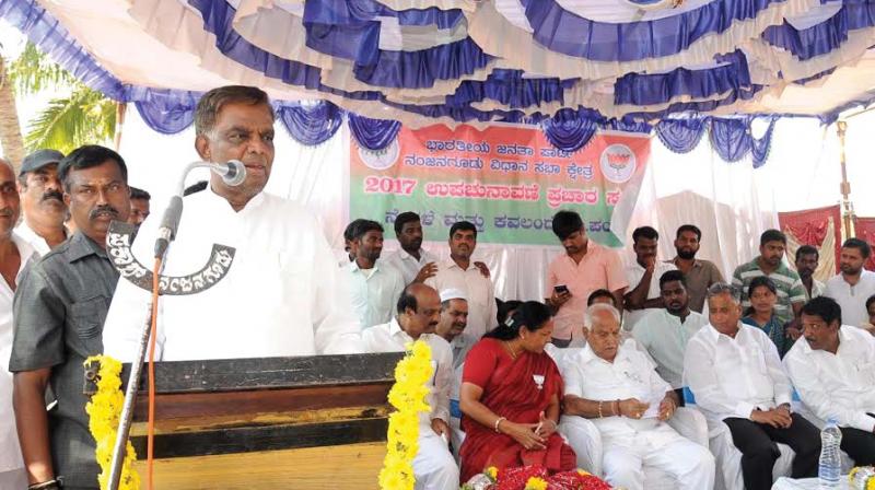 BJP candidate for Nanjangud constituency V. Srinivasprasad speaks at Nanjangud on Sunday.