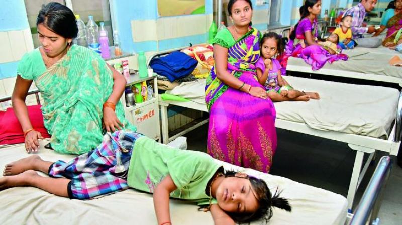 Children lying in a ward in Gandhi Hospital after suffering from chills and fever. (Photo: DC)