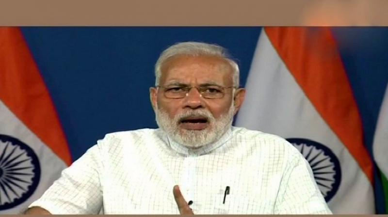 Prime Minister Narendra Modi said the focus is to ensure more women, divyang (differently abled), people from SC, ST, OBC and minority communities get access to housing. (Photo: ANI | Twitter)