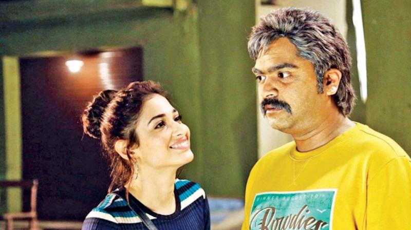 Tamannaah and STR in a still from the film.