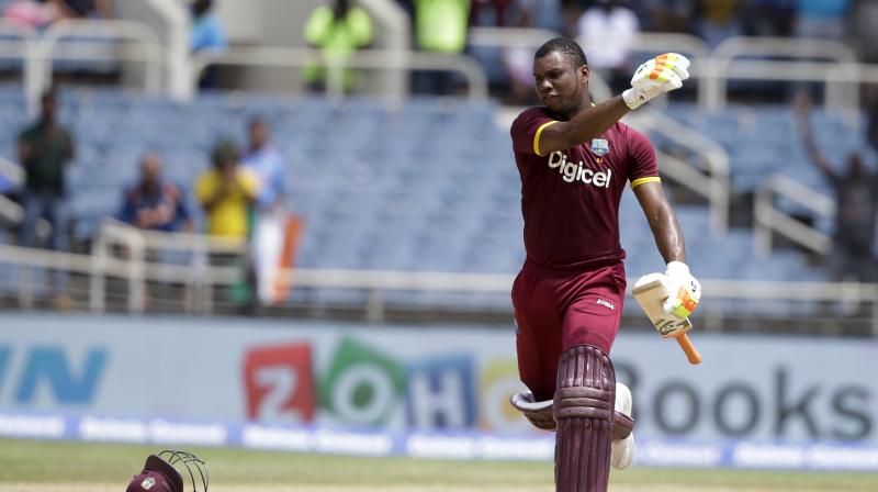 West Indies Evin Lewis celebrates after he scored a century against India during a T20I at Sabina Park cricket ground in Kingston, Jamaica, Sunday, July 9, 2017. (Photo: AP)