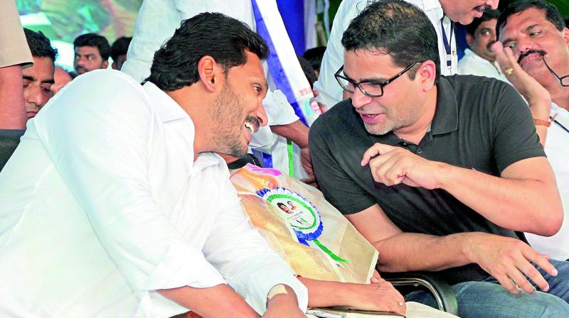 Political strategist and adviser to YSRC Prashant Kishor shares a lighter moment with Jagan. 	(Photo: DC)