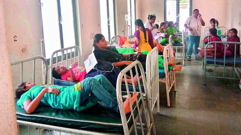 Students of Nellikuduru KGBV undergoing treatment at a ward in Mahbubabad area hospital after falling sick due to food poisoning (Photo: DC)