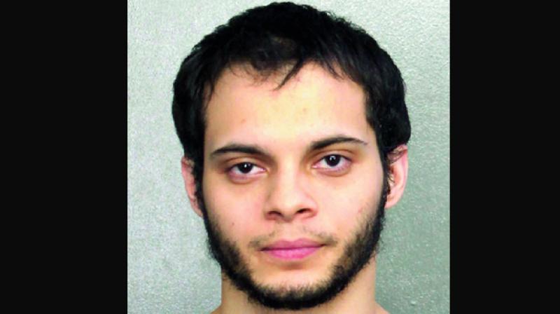 Esteban Santiago, 26, was charged with an act of violence at an international airport resulting in death which carries a maximum punishment of execution and weapons charges.