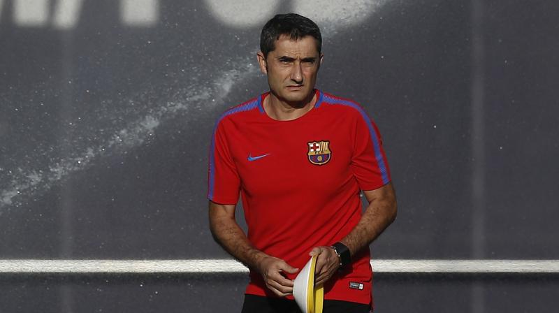 With Catalonias regional parliament approving a declaration of independence dominating news Friday Valverde was preparing Barcelona for an away game at Athletic Bilbao in Spains La Liga. (Photo: AP)