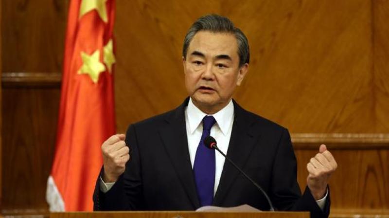 Chinese Foreign Minister Wang Yi held the first China-Afghanistan-Pakistan Foreign Ministers Dialogue in Beijing with his Afghanistan and Pakistan counterparts  Salahuddin Rabbani and Khawaja Muhammad Asif respectively. (Photo: AFP)