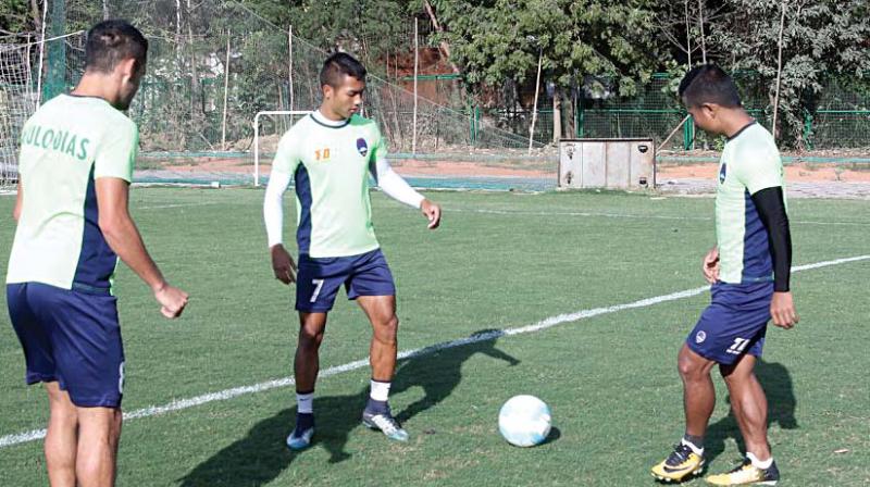 Delhi Dynamos players at a training session in Bhubaneswar on Wednesday.