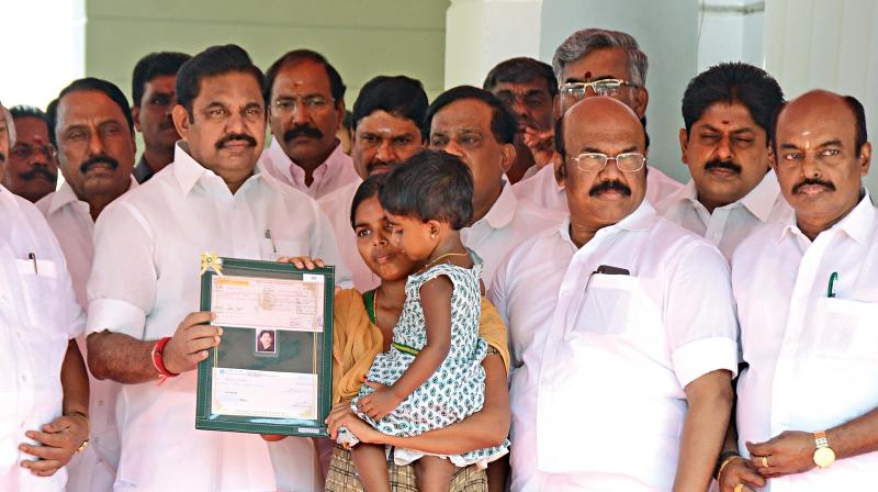 Chief Minister Edappadi K. Palaniswami hands over relief assistance at the secretariat to families of missing fishermen in Ockhi cyclone. (Photo: DC)