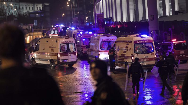 Rescue services and ambulances rush to the scene of explosions near the Besiktas football club stadium after attacks in Istanbul, late Saturday. (Photo: AP)