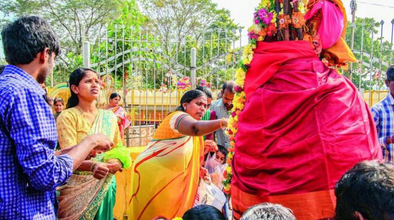 Devotees offer prayers to Goddess Sammakka and Saralamma ahead of biennial Jatara at Medaram on Wednesday. (Photo: DC/File)