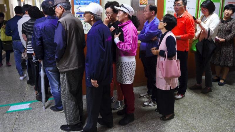 Exit poll results will be available immediately after voting closes at 8 p.m. (11:00 GMT). (Photo: AFP)