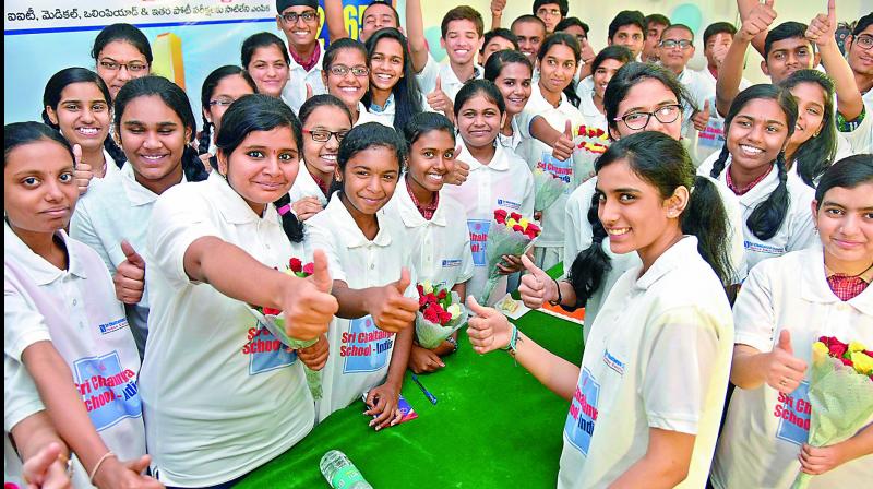 SSC exams toppers of Chaitanya Institute greet each other and pose for a picture at their institute in the city on Wednesday.