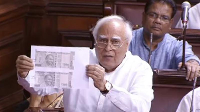 Kapil Sibal said different sizes of these notes were being printed  one for the ruling party (members) and one for the others. (Photo: RSTV screengrab)