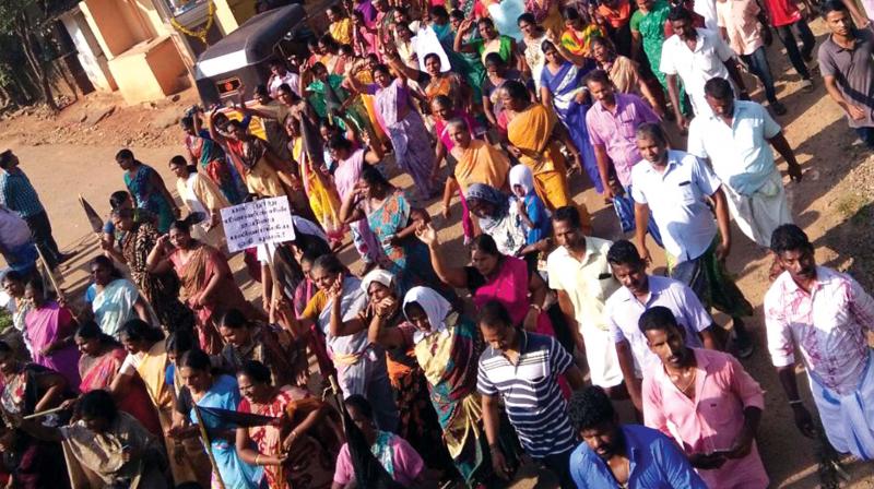 Fishermen from eight villages in Kanyakumari hold a road and rail roko agitation at the Ulithurai railway station on Thursday against the failure of the Tamil Nadu Government in rescue operations in wake of Ockhi cyclone. 	BY ARRANGEMENT