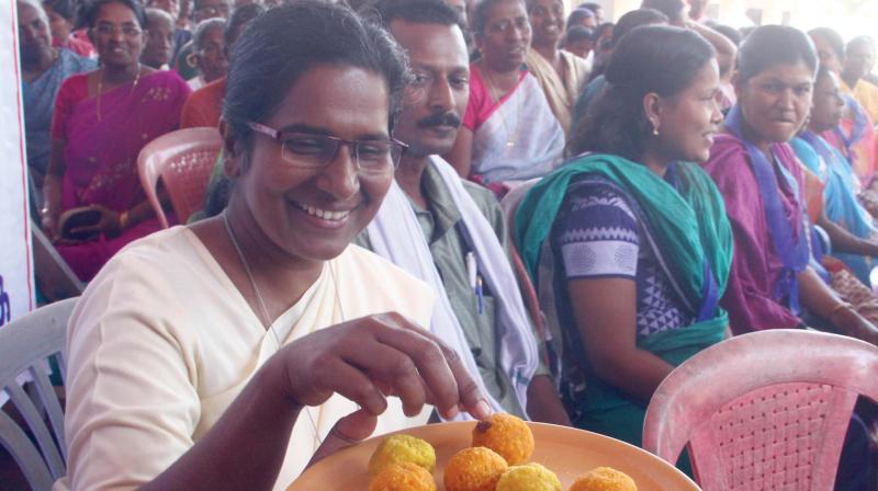 Residents of Chellanam share sweets after the six-day protest was called off on Saturday. (Photo: DC)