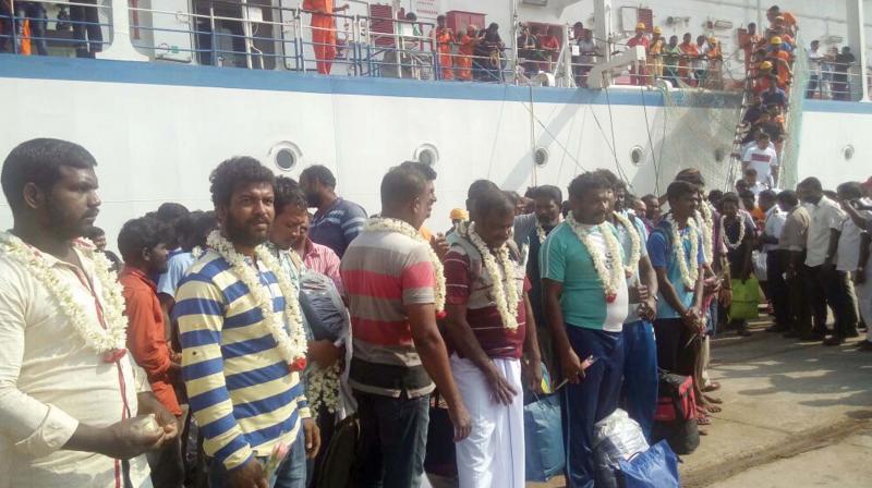 Fishermen who arrived by MV Kavaratti being received at Cochin Port on Saturday.