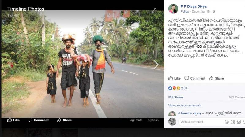 The photo shows two kids walking barefoot on the road along with two men towards Sabarimala.