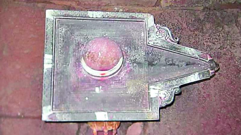 The Shiva Lingam with ancient inscription.