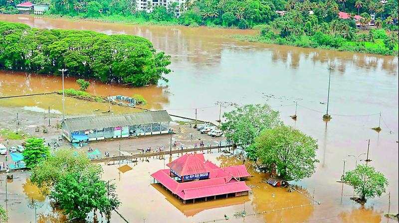 An aerial view of Aluva town following a flash flood, in Kochi on Sunday. (Photo: PTI)