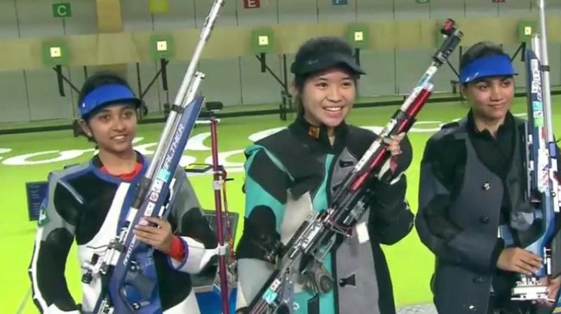 17-year old Mehuli Ghosh fell marginally behind Singapores Martina Lindsay Veloso, who bagged gold, while Apurvi Chandela, with a score of 423.2, set a new qualification Games record. (Photo: Twitter / India All Sports)