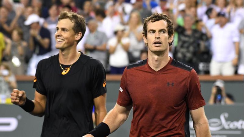 Vasek Pospisil, ranked 129th in the world, triumphed 6-4, 7-6 (7/5), sealing the biggest win of his career on his fourth match point to the delight a stadium court crowd won over by the underdogs aggressive serve-and-volley style. (Photo: AP)