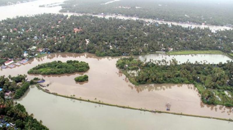 An aerial view of Aluva town following a flash flood after heavy rains, in Kochi. (Photo: PTI)