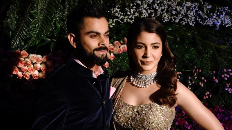 While a video of Virat Kohli and Anushka Sharma dancing with none other than Shah Rukh Khan had gone viral, a new video from the Mumbai reception, where the two are dancing on the beats of Mere Rashke Qamar, has taken the internet by storm. (Photo: PTI)