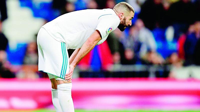 Real Madrids French forward Karim Benzema is distraught at the end of the Spanish Copa del Rey (Kings Cup) quarterfinal second leg agaisnt Leganes at the Santiago Bernabeu stadium in Madrid on Wednesday.	 AFP
