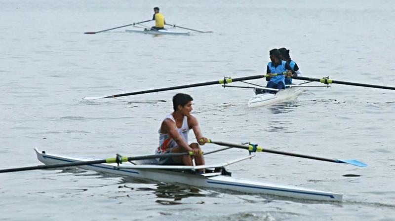 Participants take a rowing practice ahead of the competition. (Photo: DC)