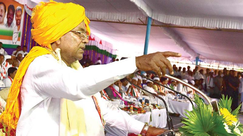 Chief Minister Siddaramaiah speaks at a Congress rally at Kudalasangama near Bagalkot on Thursday