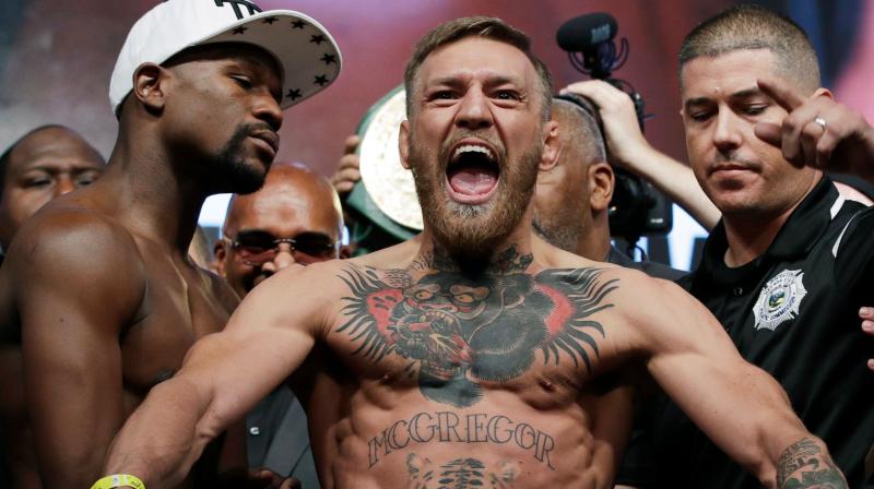 Video of the incident clearly showed Conor McGregor hurling a dolly through a side window of the bus as it moved slowly in a car park at the Barclays Center in New York. (Photo: AP)