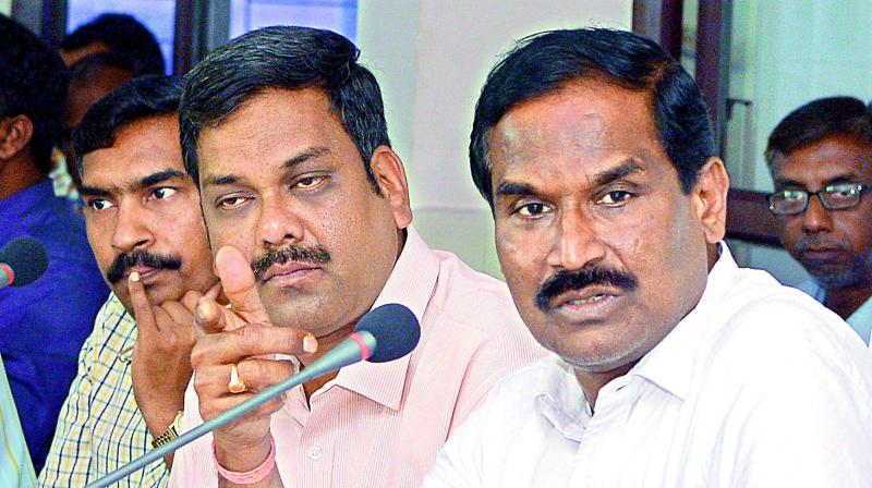 Panchayat raj commissioner Ramanjaneyulu and officials of the department at a media conference in Vijayawada on Tuesday. (Photo: DC)
