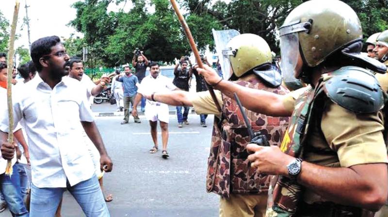 Youth dare police during a protest march in Thiruvananthapuram city. (File pic)